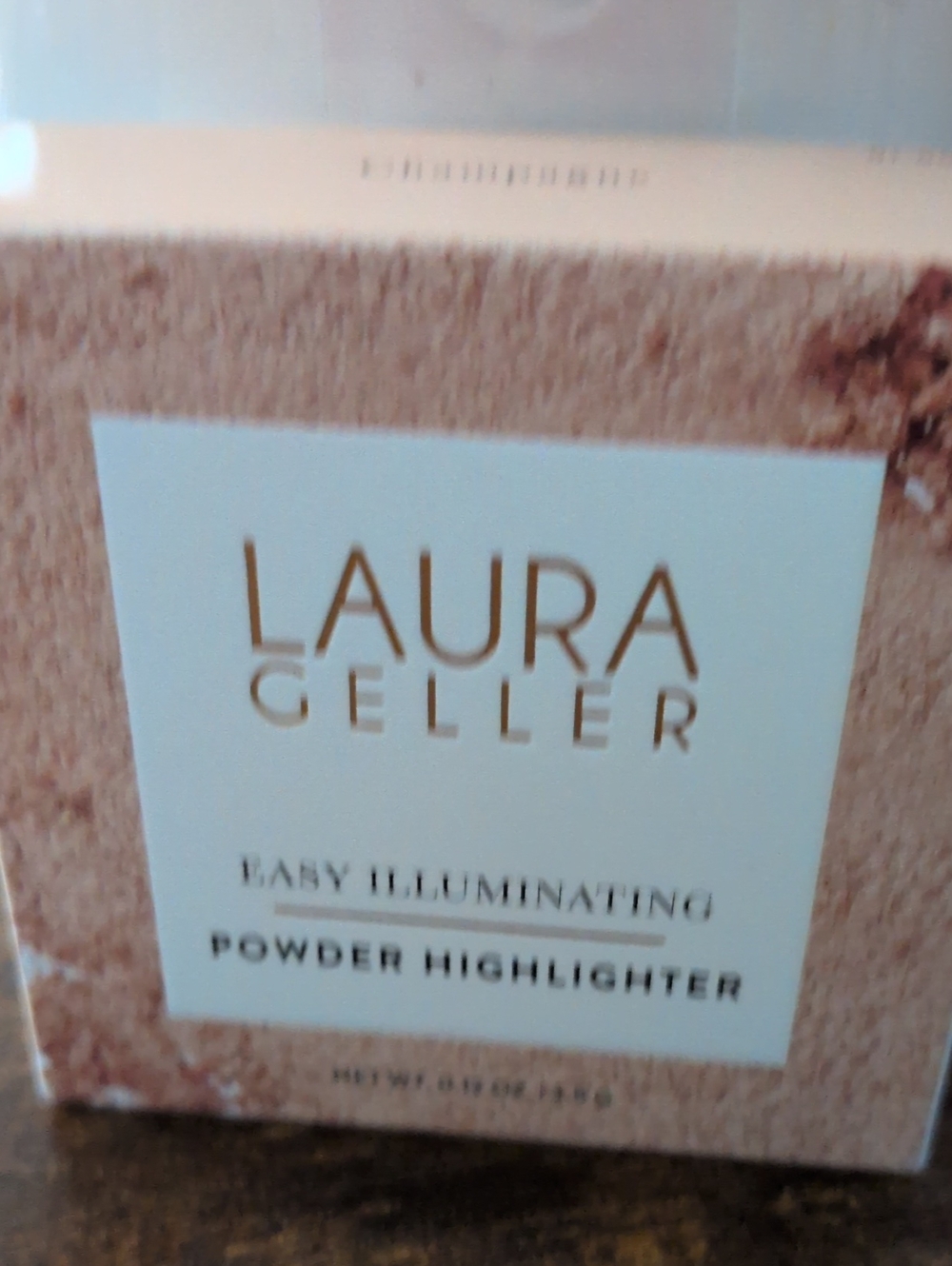 Laura Geller Powder Highlighter Champagne Color
